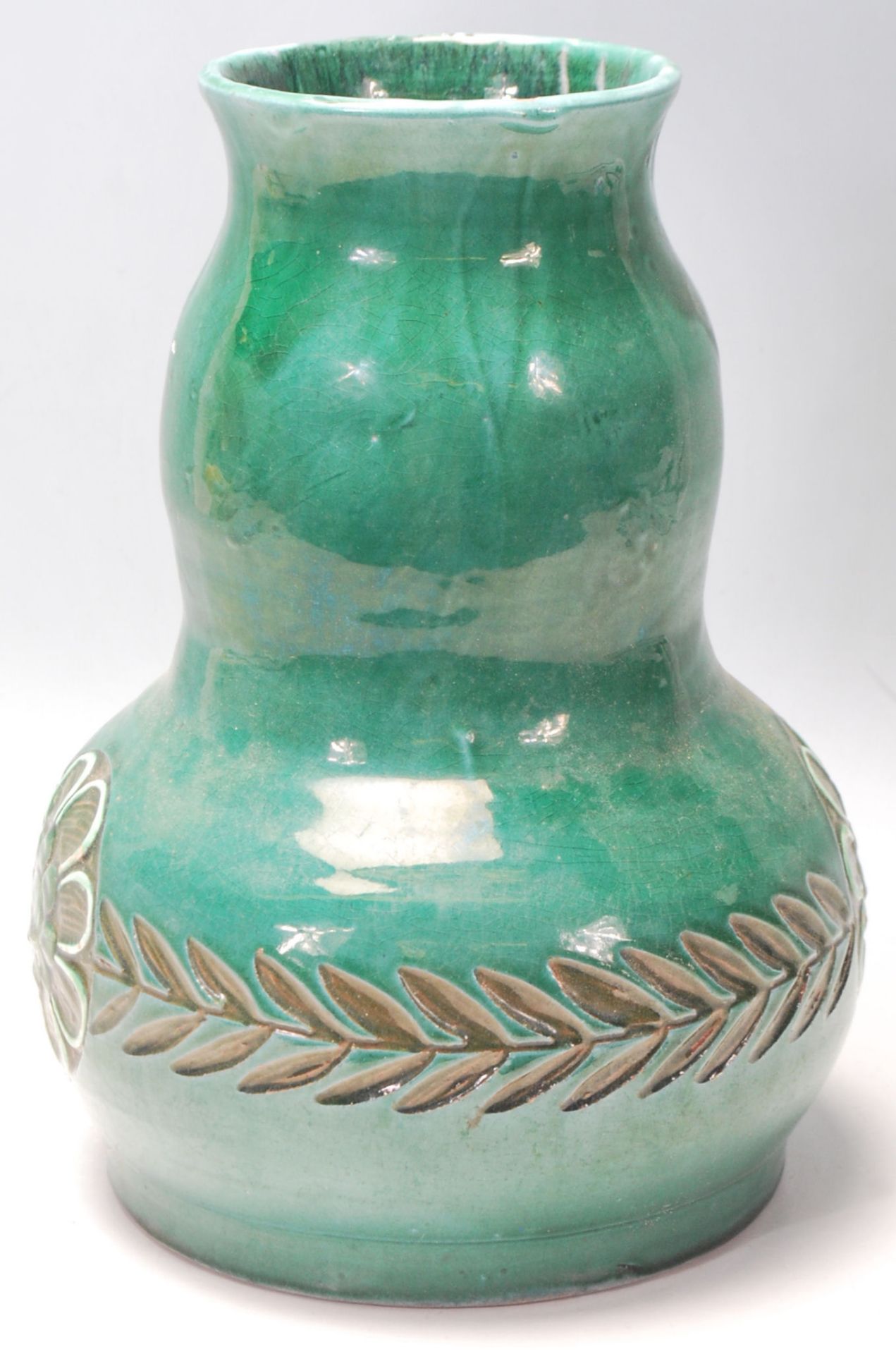 An early 20th Century Devonia Art Fremington Barum terracotta vase by Ed Judler in a bulbous form - Image 4 of 6