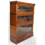 A late 19th century Victorian Globe Wernicke style 3 tiered lawyers / barristers bookcase having a