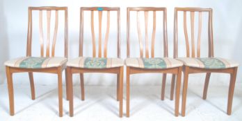 G-Plan Furniture - A set of four vintage retro G Plan teak wood dining chairs having floral padded