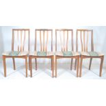 G-Plan Furniture - A set of four vintage retro G Plan teak wood dining chairs having floral padded