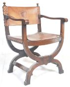 An early 20th Century Italian Tuscan Savonarola oak and leather  framed armchair. The oak frame