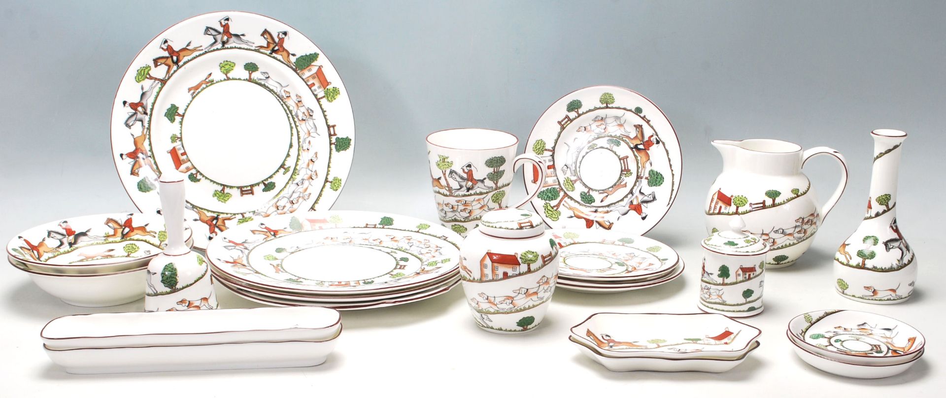 A vintage 20th Century Crown Staffordshire “ Hunting Scene “ fine bone china part dining set