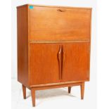 A retro vintage mid 20th century teak wood Danish manner drinks / cocktail cabinet of two tiered