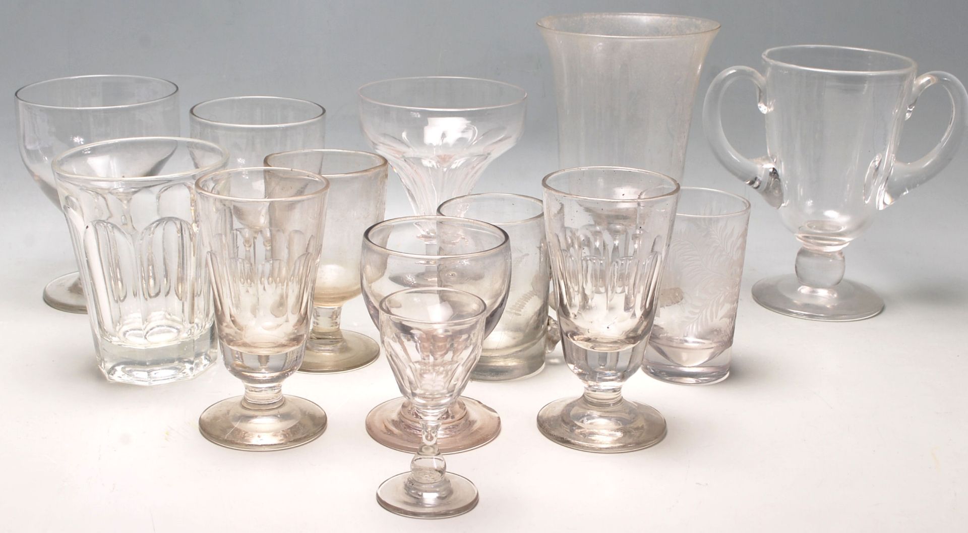 Aa collection of late 19th century and 20th century Victorian cut glass drinking glasses to