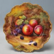 A Royal Worcester plate dish dated 1929 by HH Price hand painted / decorated with fruit to a mossy