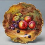 A Royal Worcester plate dish dated 1929 by HH Price hand painted / decorated with fruit to a mossy