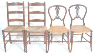 A pair of Victorian 19th century mahogany and rush seated bedroom chairs having splat back and