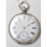 A 20th Century French continental silver pocket watch having engine turned decoration to the back