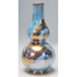 A 1930's Wedgwood fairyland lustre double gourd bl