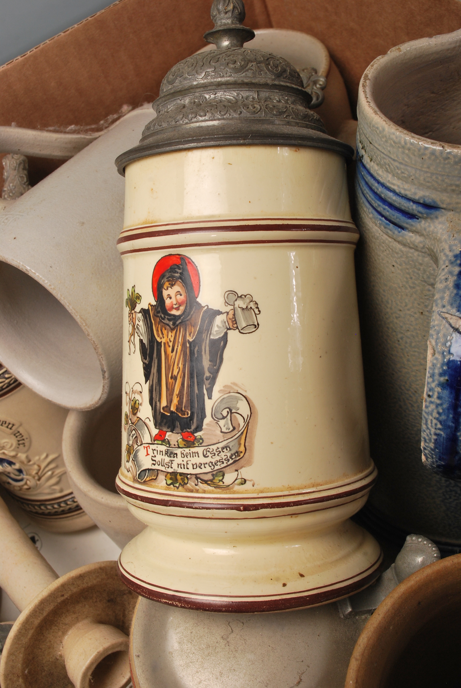 A large collection of German blue and grey stoneware jugs and beer steins, some having pewter - Image 9 of 10