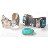 Two pieces of silver white metal Native American Navajo jewellery to include a bangle set with a