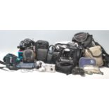A collection of vintage retro camera equipment to include a Pentax P30, Lumix FZ38, SMC PENTAX- A
