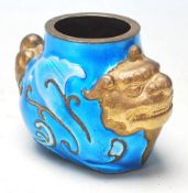 A 20th Century hand painted Chinese brass Ink well in the form of a Fu dogs  in gilt with cobalt