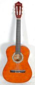 A vintage Elevation made six string acoustic guita