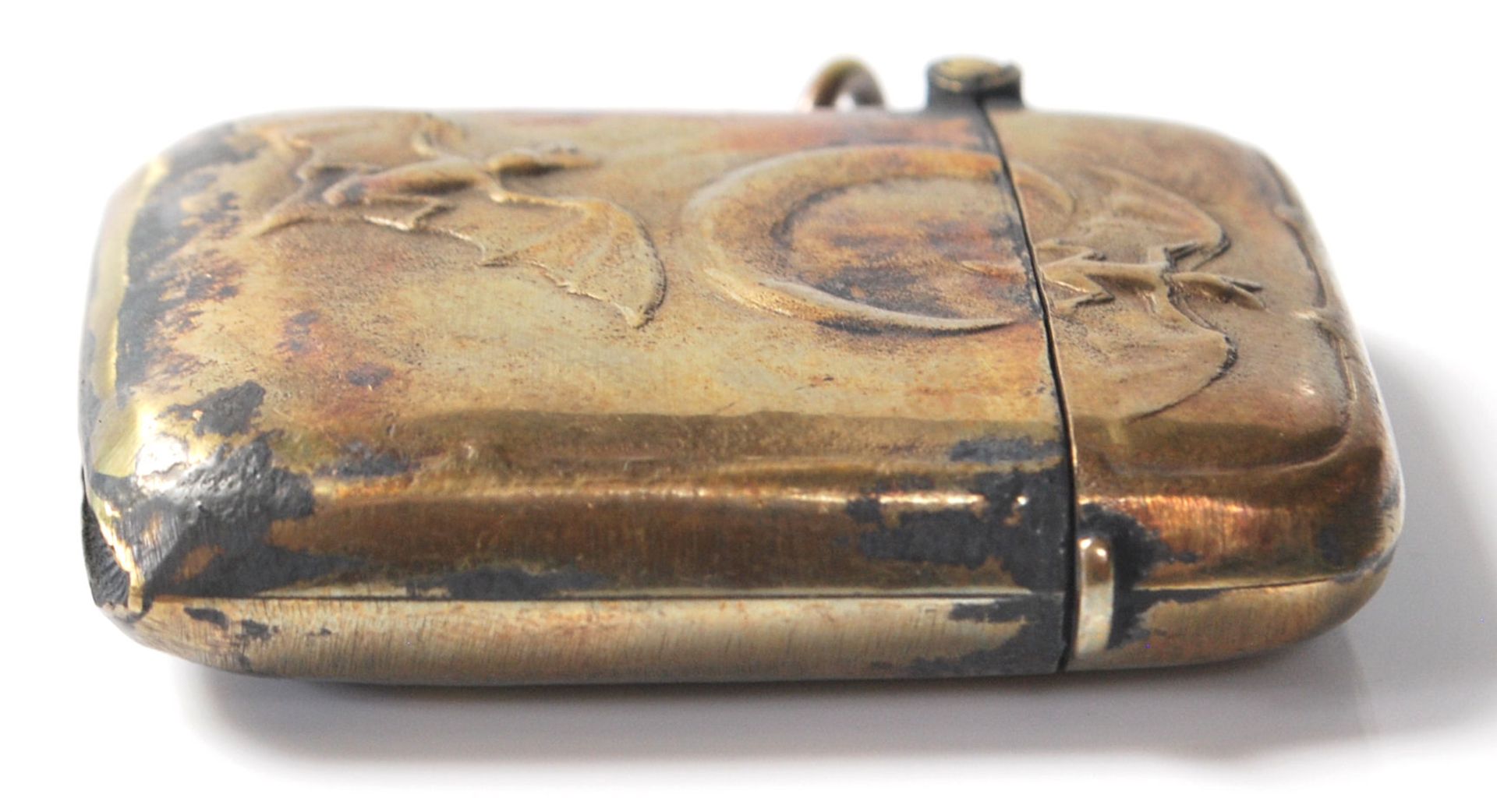 A vintage 20th Century brass vesta case decorated with a crescent moon and bats in flight. Striker - Bild 4 aus 6