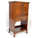 An antique Edwardian mahogany filing cabinet / music cabinet with a raised back, 5 fall front