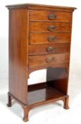 An antique Edwardian mahogany filing cabinet / music cabinet with a raised back, 5 fall front