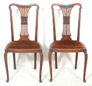 A pair of late 19th century Victorian Art Nouveau mahogany dining chairs / hall chairs having padded