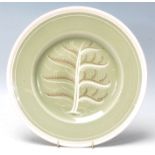 Art Deco Susie Cooper “ tree of life “ cabinet plate with green colour background white rim and tree