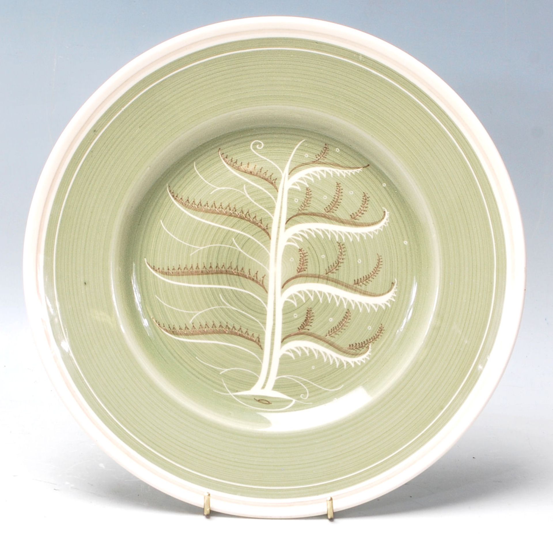 Art Deco Susie Cooper “ tree of life “ cabinet plate with green colour background white rim and tree