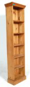 An antique style large country pine tall open window bookcase cabinet. Raised on plinth base with