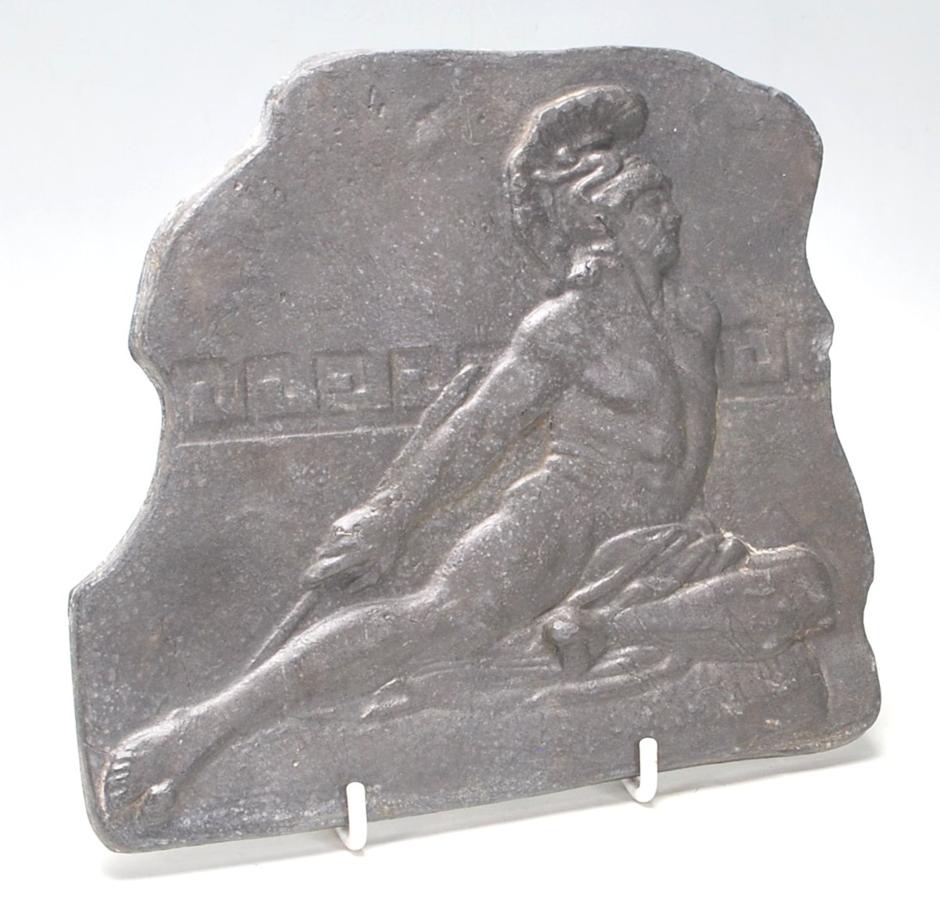 A good 20th Century heavy lead plaque depicting the death of Achilles with an arrow in his heel