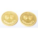 A pair of 1/4 oz 24ct gold coins from the Perth Mint commemorating the 70th Anniversary of the Royal