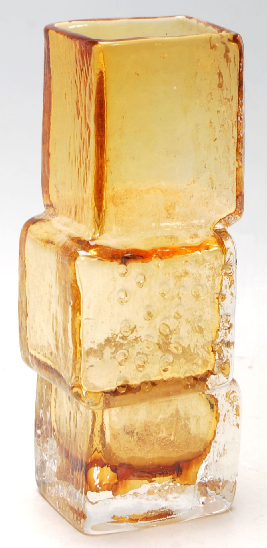 Whitefriars (Manner Of) - A vintage amber glass ' Drunken Bricklayer ' type vase in the manner of