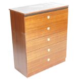 A mid 20th century retro vintage mahogany veneer chest of drawers. The upright chest with  a bank of