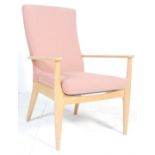 A vintage mid century Parker Knoll  armchair. The chair with square tapering legs and shaped elbow