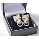 A pair of sterling silver and CZ Cartier style earrings having the iconic " Pantheiere de
