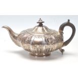 A 19th Century William IV silver hallmarked John, Henry & Charles Lias tea pot having a sectional