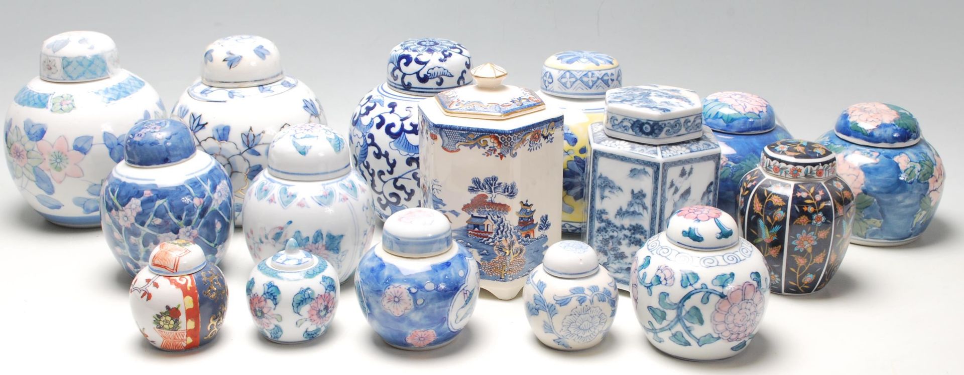 A collection of 20th Century Chinese ginger jars of various styles and forms to include some printed