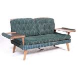 A vintage retro Danish Influenced 1970's sofa bed / settee having a wooden frame with rail