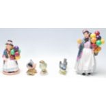 Two 20th Century Royal Doulton figurines to include Balloon Girl HN 2818 and Biddy Pennyfarthing