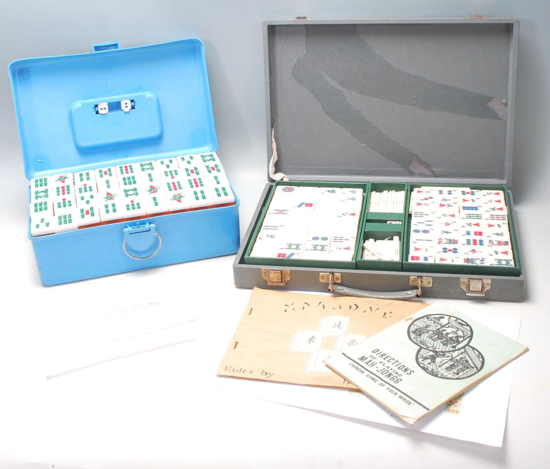 Two mid 20th Century Oriental Mahjong set, one set having plastic pieces with clear flower