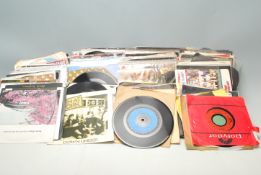 A large collection of vintage vinyl 45s records from the 60s, 70, 80, & 90s to include Human League,