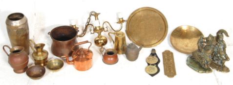 A collection of antique and 20th Century brassware to include a Victorian copper kettle, Indian