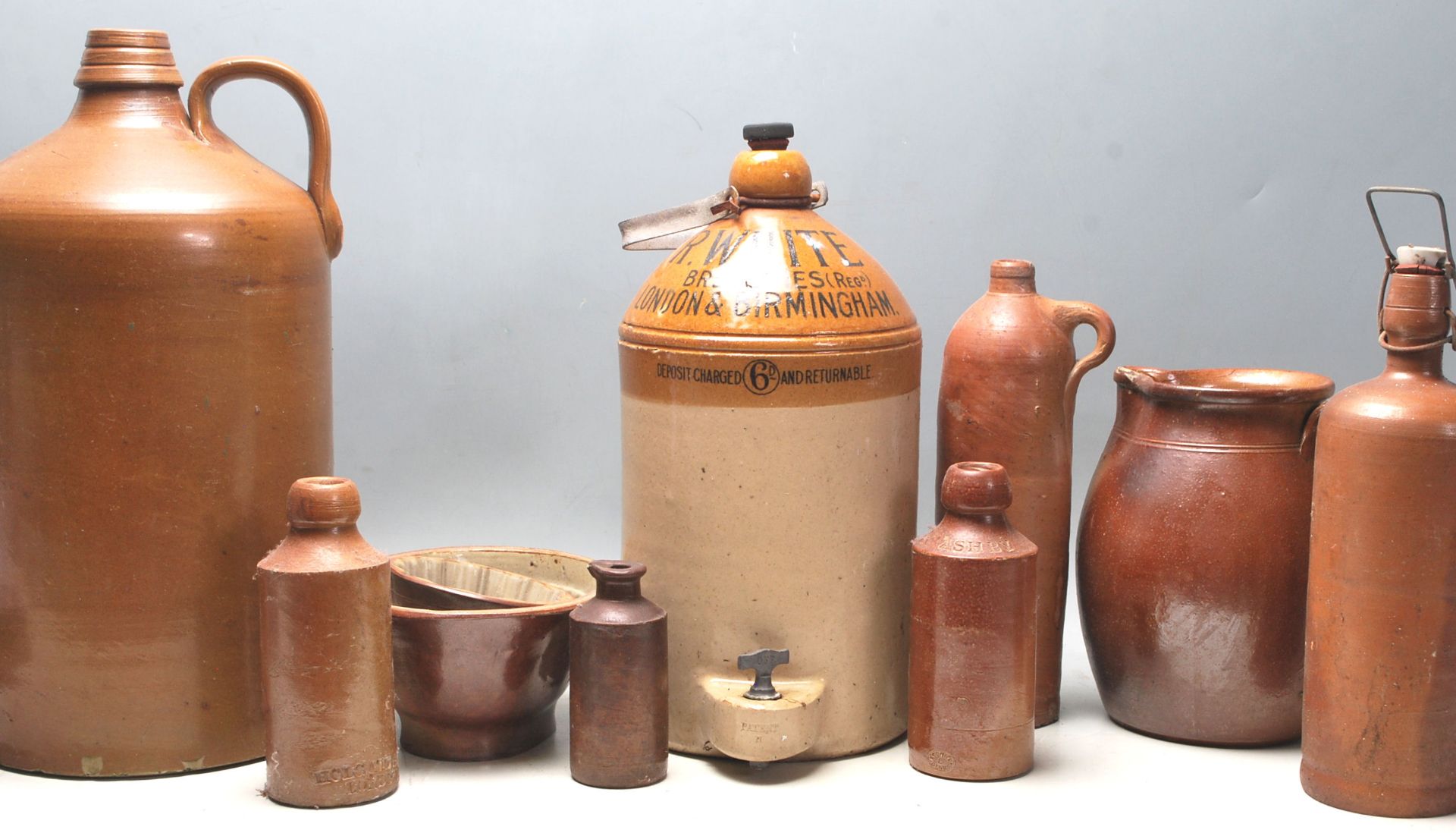 A good quantity of 19th century Victorian stoneware jugs and bottles