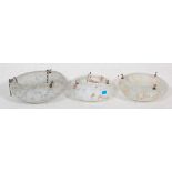 A group of three 1930's Art Deco spatter glass light shades to include a dome shaped shade with blue