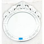 A contemporary 20th Century antique style Italian Venetian wall mirror of round form having a