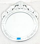 A contemporary 20th Century antique style Italian Venetian wall mirror of round form having a