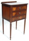 A 20th Century antique regency style flame mahogany bedside table / cabinet having a stage gallery