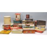 A large collection of vintage mid 20th Century metal advertising tins, biscuits tins, tobaccos