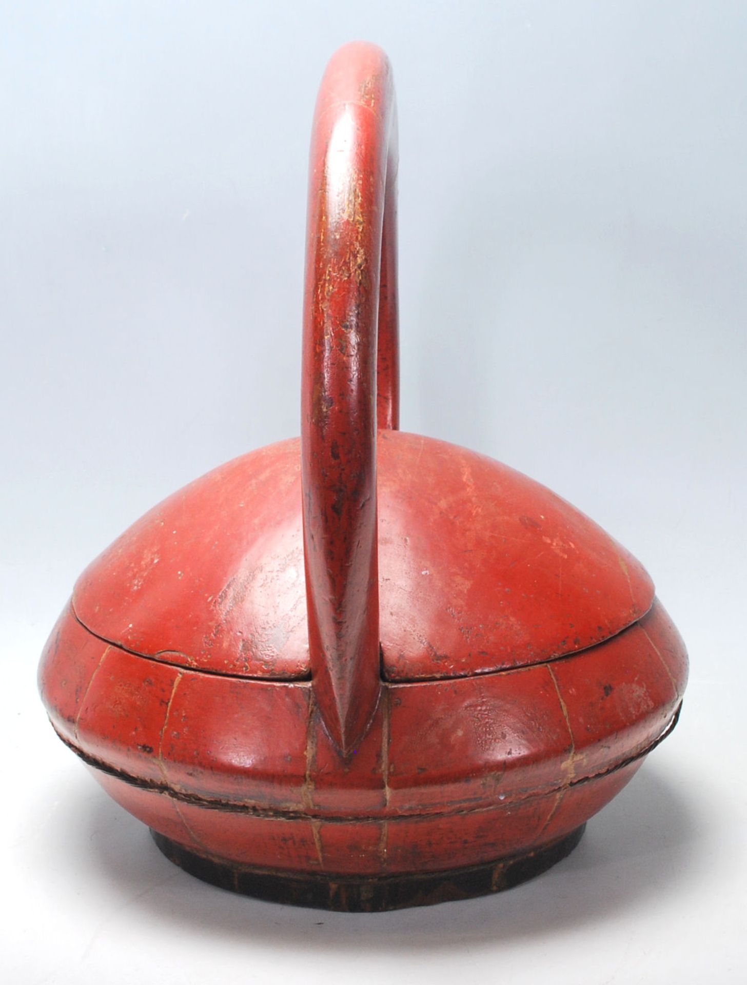 A 20th Century Chinese wooden box of round domed form having a large carved wooden domed handle to - Image 4 of 8