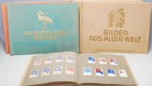 A good collection of German & International cigarette cards / picture cards to include Flags of
