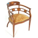 An antique late Victorian / Edwardian mahogany inlaid bedroom chair with a circular fan motif having