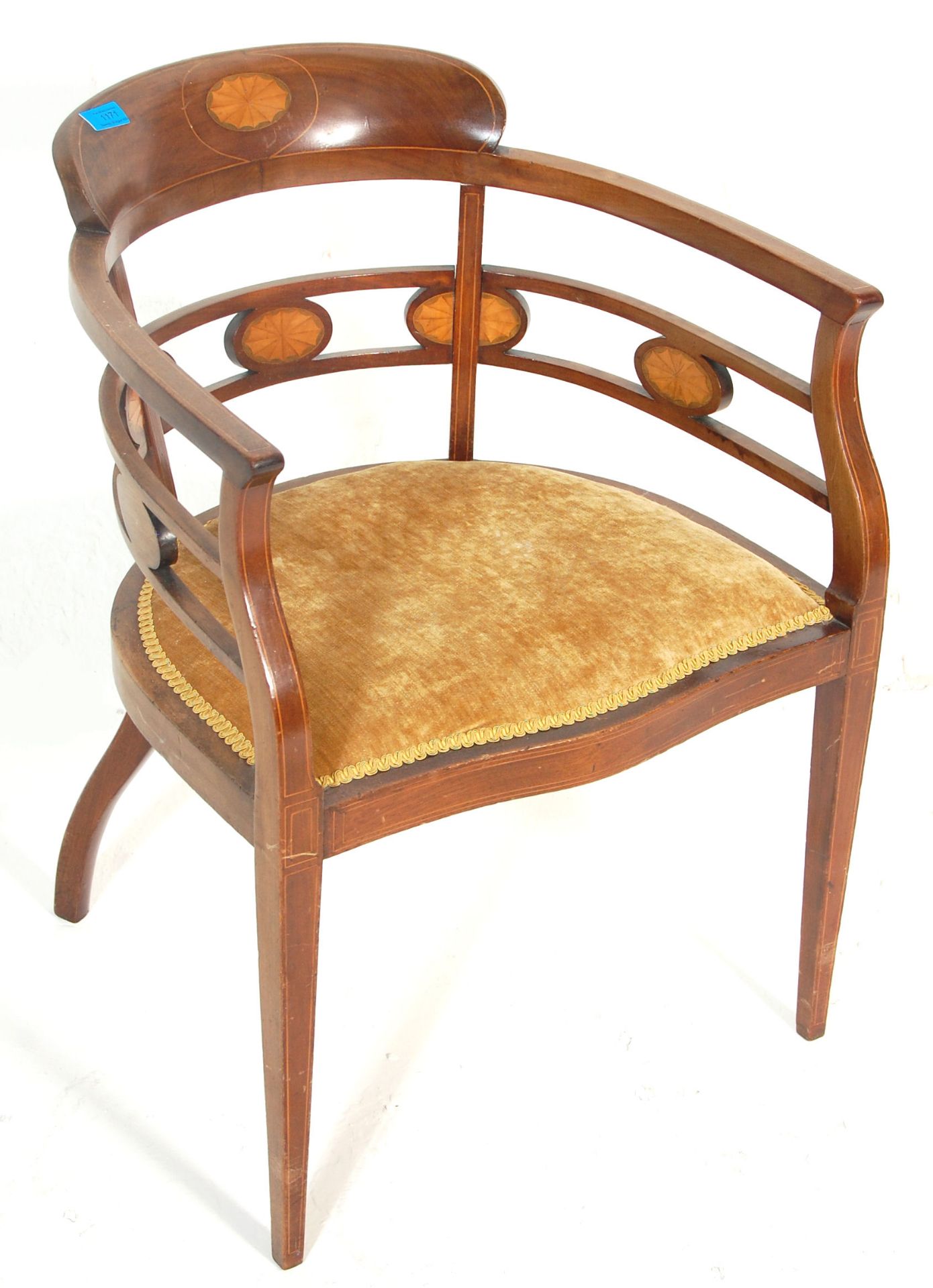 An antique late Victorian / Edwardian mahogany inlaid bedroom chair with a circular fan motif having