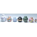 A group of 20th Century Chinese ginger jars of various styles to include blue and white floral