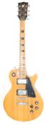 A vintage 1970s Kay K-30 Les Paul style electric guitar having chrome tunings pegs to the